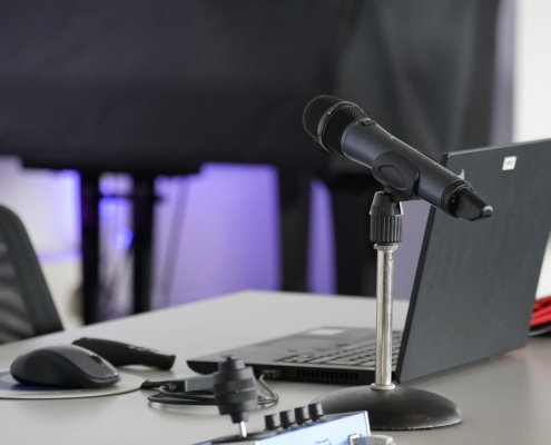 a laptop and microphone